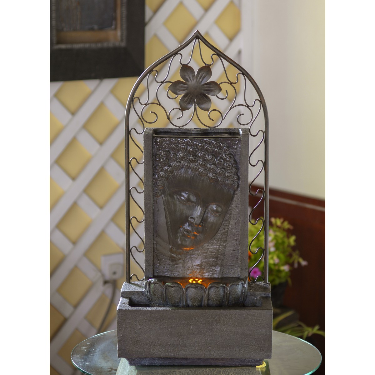 resin meditating buddha on column patio fountain with led light
