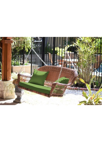 Honey Resin Wicker Porch Swing with Hunter Green Cushion