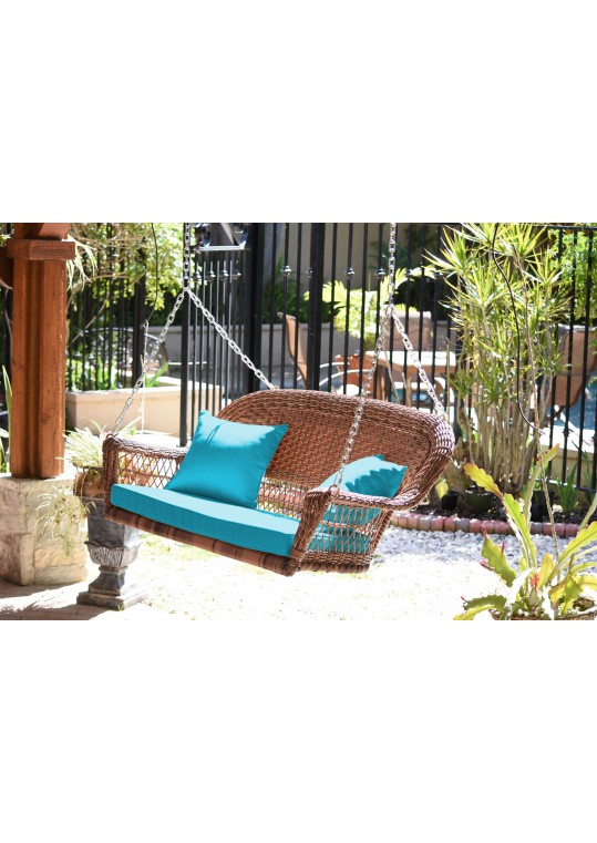 Honey Resin Wicker Porch Swing with Sky Blue Cushion