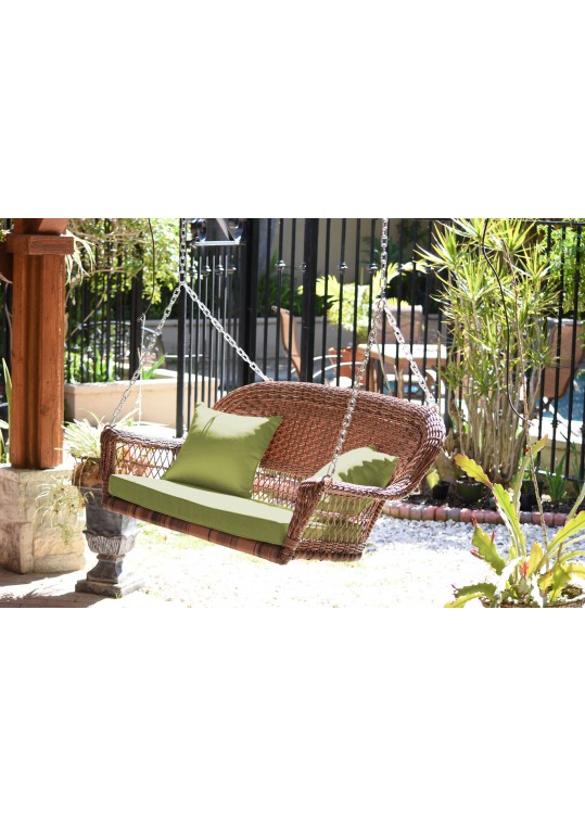 Honey Resin Wicker Porch Swing with Sage Green Cushion