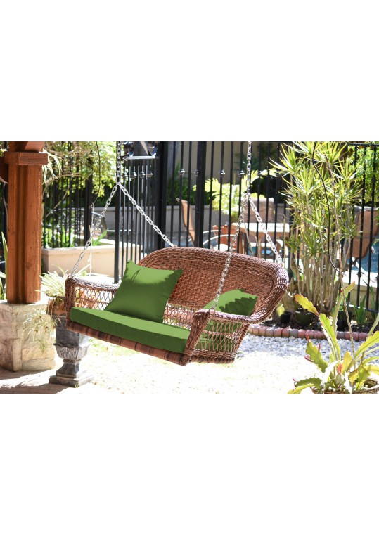 Honey Resin Wicker Porch Swing with Hunter Green Cushion