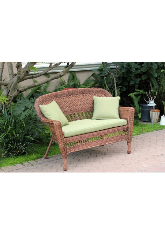 Honey Wicker Patio Love Seat With Sage Green Cushion and Pillows