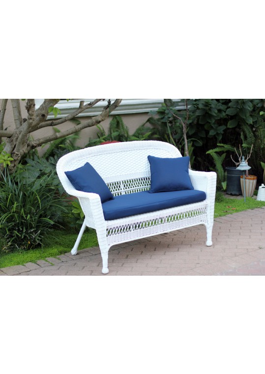 White Wicker Patio Love Seat With Midnight Blue Cushion and Pillows