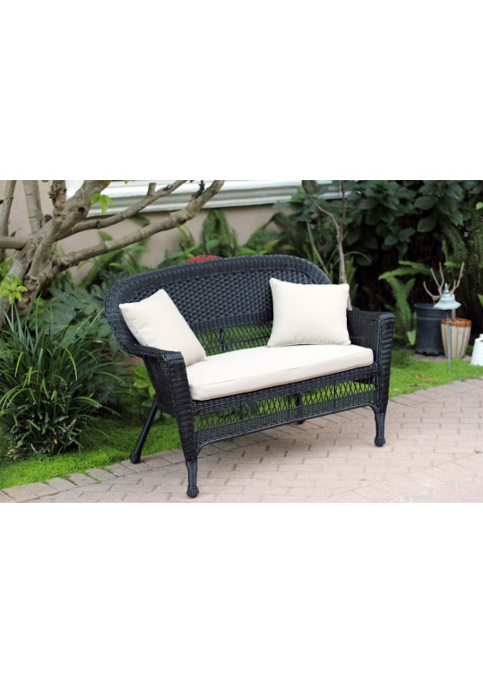 Black Wicker Patio Love Seat With Tan Cushion and Pillows
